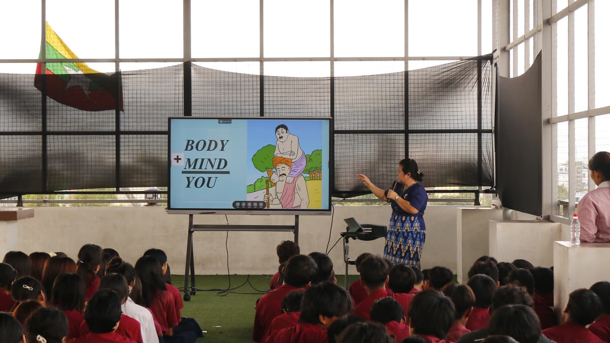 Teacher and students in Body + Mind wellness session
